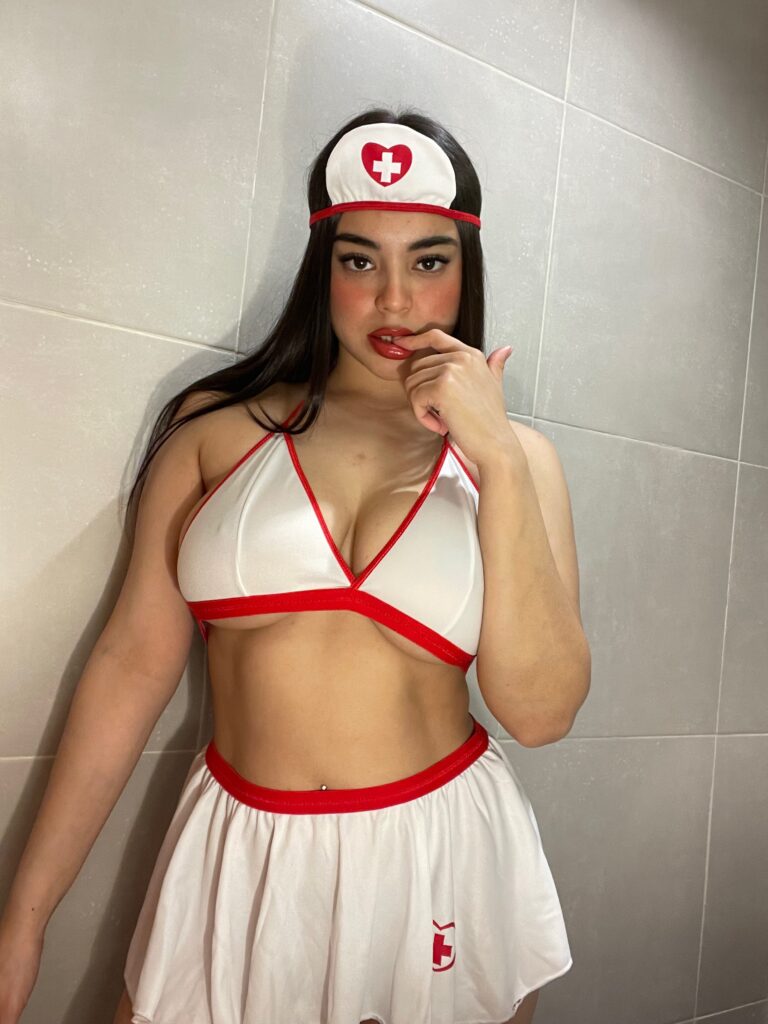 Angelina Sweetie shows her hot body in sexy white and red nurse outfit 